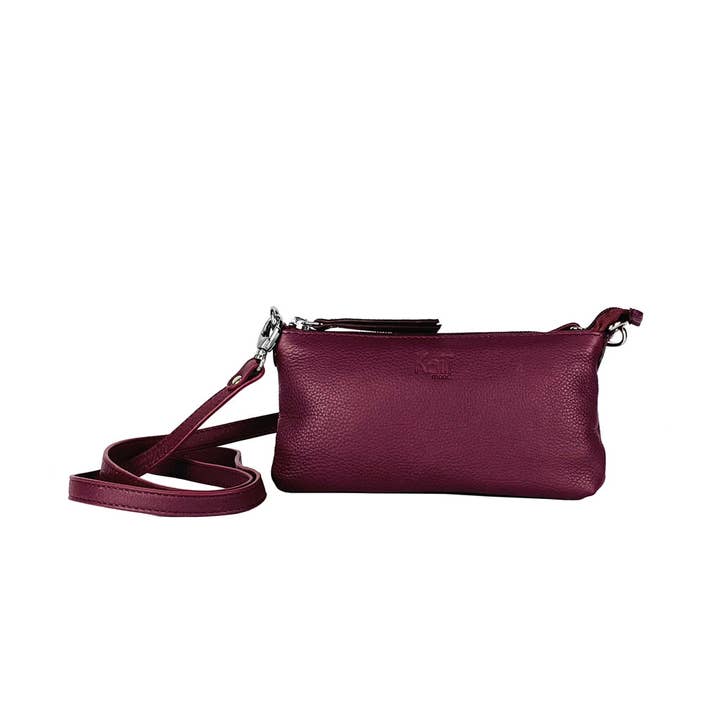 K0013NB | Women's full-grain genuine leather shoulder bag, with light grain. Removable shoulder strap. Polished Nickel Accessories. Mauve color. Dimensions: cm 20 x 10.5 x 2. Packaging: TNT bag and other Purchase Wholesale tracolla. Free Returns & Net 60 Terms on Faire trending on Faire.