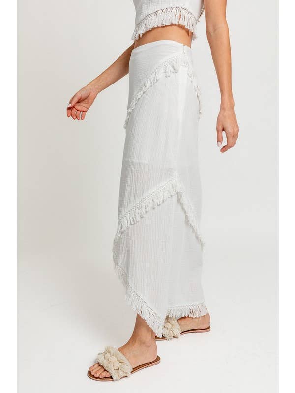White LOW WAIST FRINGE TRIMMED MAXI SKIRT for wholesale on Faire