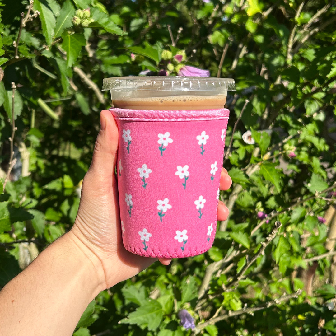 Sun and Mind Co. - Wholesale Drink Huggers & Koozies - Pink and White Flower Field Iced Coffee Drink Sleeve0