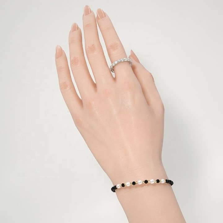 Artisans de Madagascar – wholesale Beaded bracelet – Black Tourmaline Bracelets Faceted Beads between 3 & 4 mm5