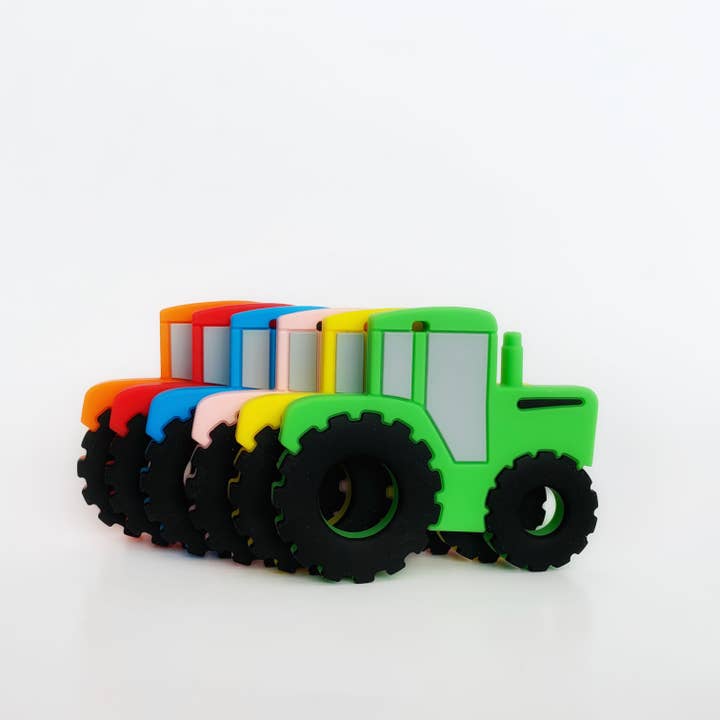 Tractor Teether With Clip ( Silicone ) for wholesale by Pebble To Peak