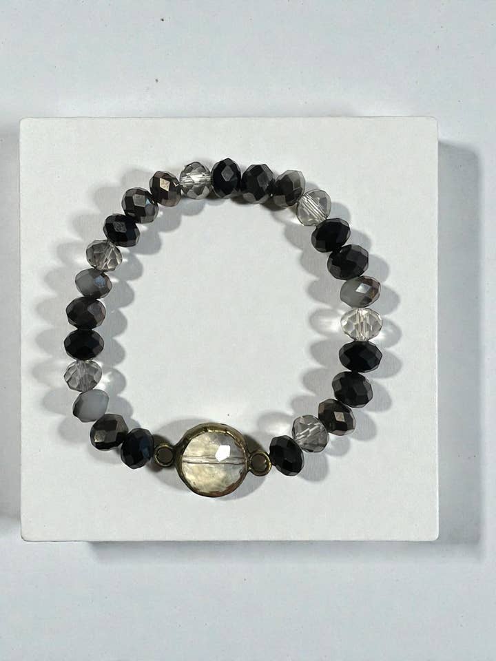 Bracciale firmato Ava bicolore con accento rotondo elastico per la vendita all'ingrosso da parte di Ava Capri