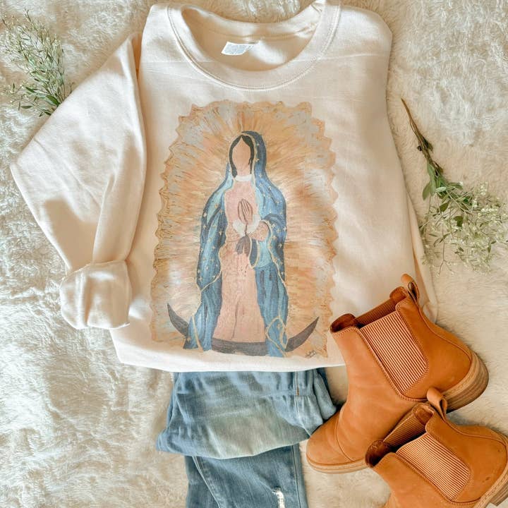 Our Lady of Guadalupe Sweatshirt on Sweet Cream and other Purchase Wholesale echarpe homme. Free Returns & Net 60 Terms on Faire trending on Faire.