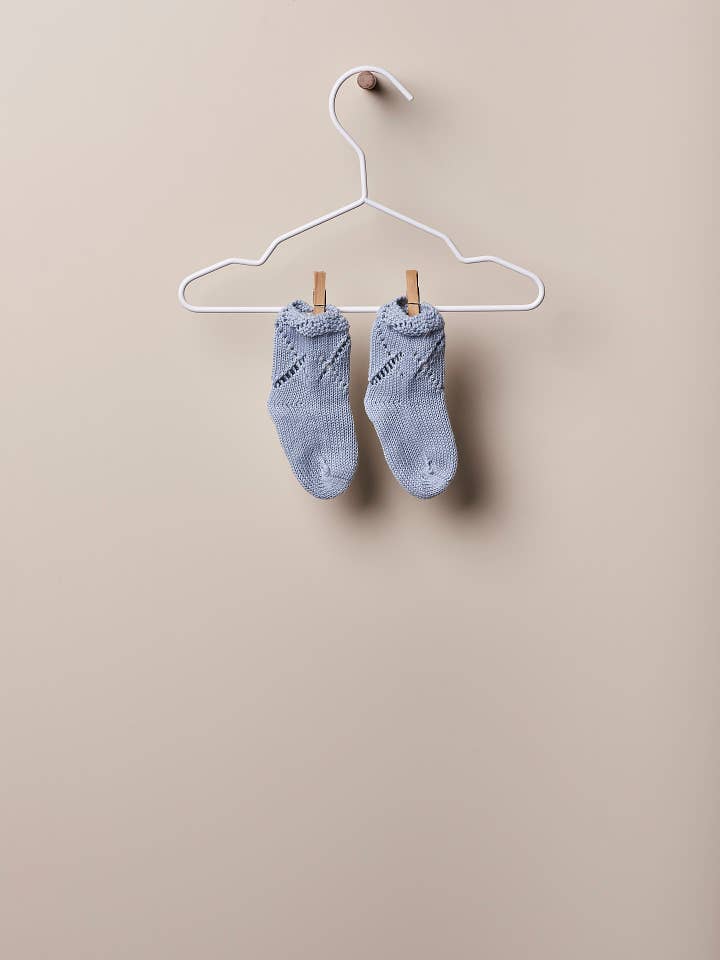 Booties knitted in organic cotton | PURE for wholesale by Wedoble: sustainable children's fashion