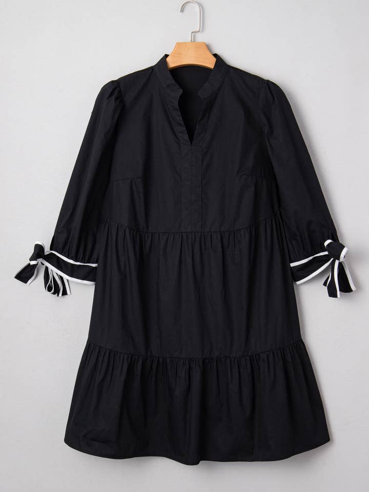 Black Plus Size Colorblock Knot Cuff Mini Dress for wholesale on Faire0