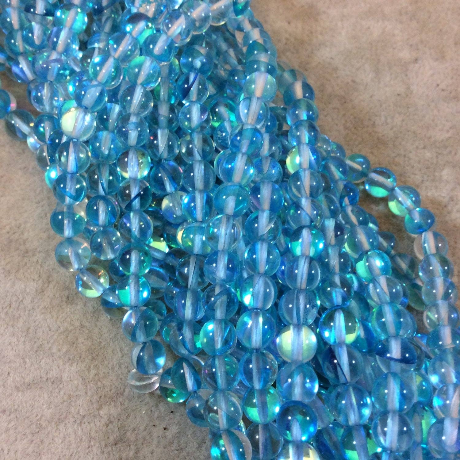 Only Beads - Wholesale Beads - Aqua Moonstone Glass Beads–6mm Smooth Round Strand (67 pcs)0