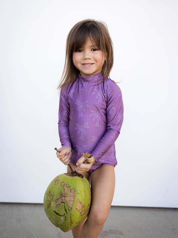 Girl's Long Sleeve Zip Up in Purple Palm Trees for wholesale by Of One Sea