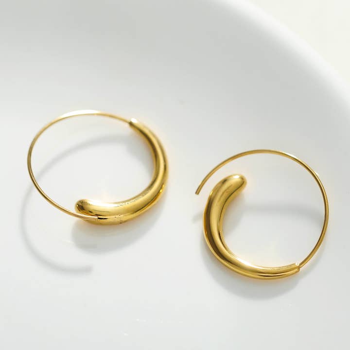 NURAL Swirl Hoops Gold for wholesale by HACKNEY NINE