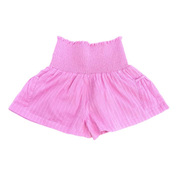 AS Pink Ruffle Smocked Shorts med lommer for engroshandel hos Little Olin