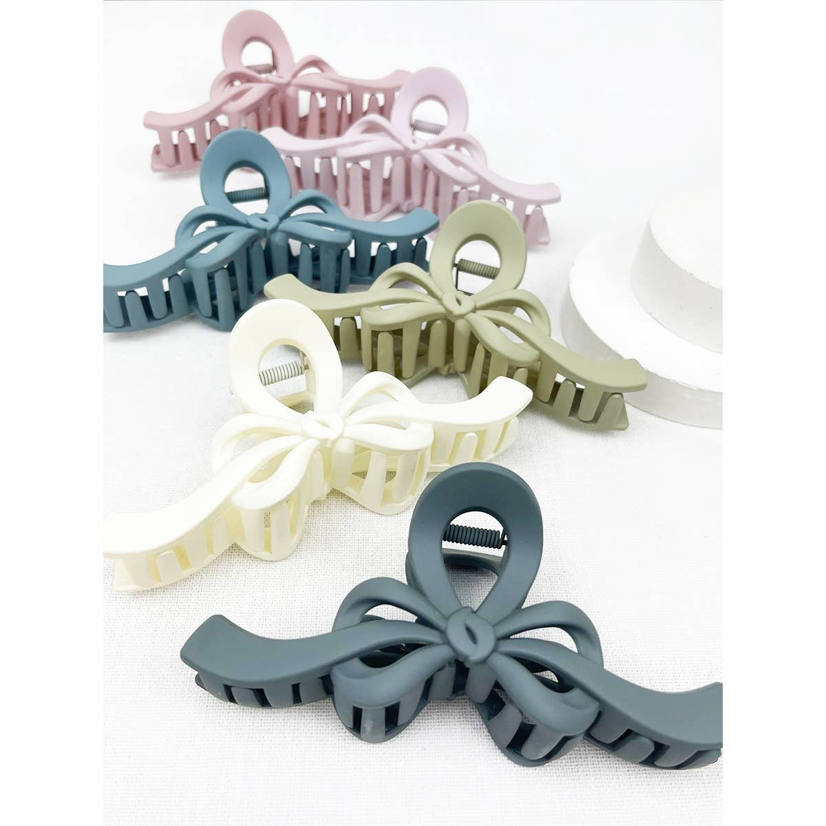 MIX COLOR Knotted Bow Soft Tone Matte Hair Claw for wholesale on Faire7