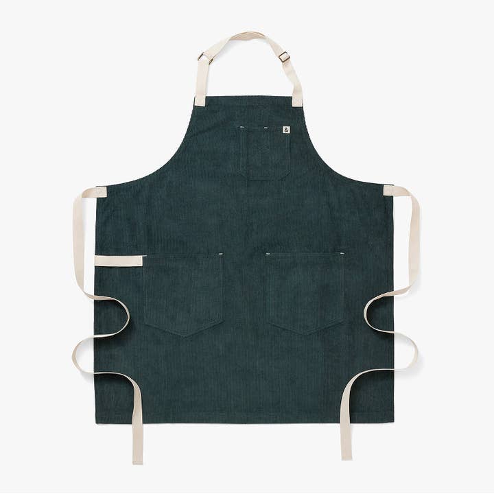 The Corduroy Essential Apron - Conifer Green for wholesale by Hedley & Bennett