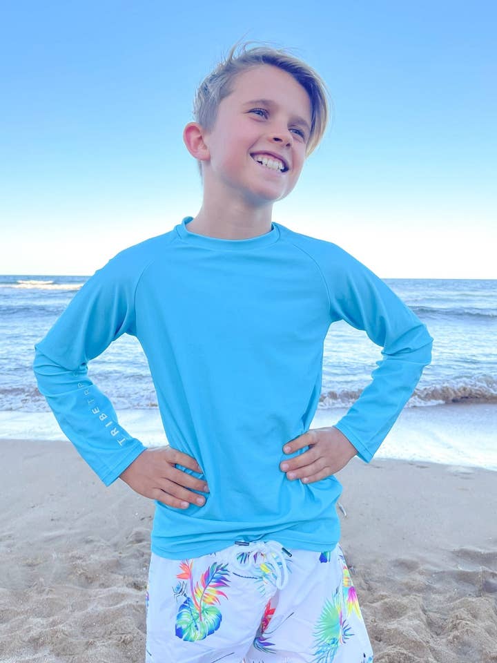 Kids Rash Guard Top - Arafura (Light Blue) for wholesale by Tribe Tropical