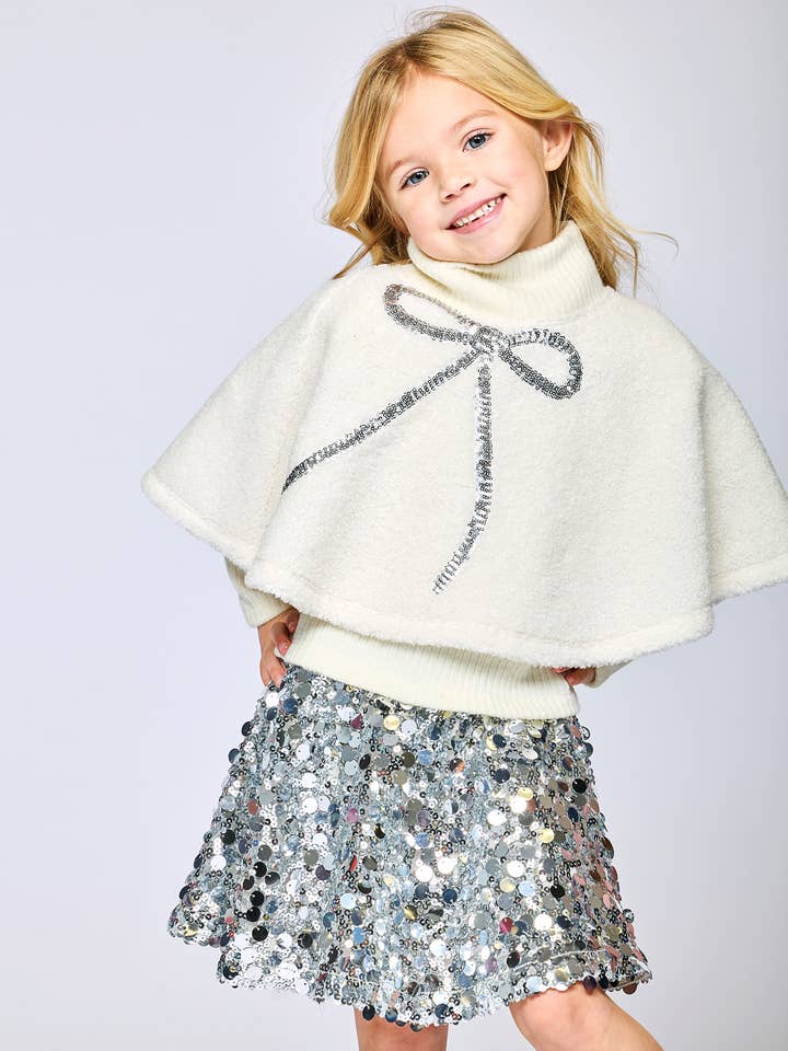 Sherpa Poncho W/ Sequin Bow Detail for wholesale by Hannah Banana , Baby Sara