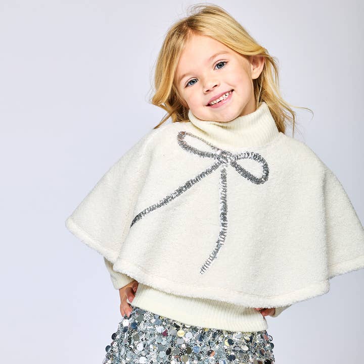 Sherpa Poncho W/ Sequin Bow Detail for wholesale by Hannah Banana , Baby Sara