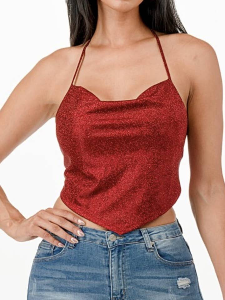 KNUTEN GLITTERTOPP MED ÖPPEN RYGG
för wholesale av JBLA FASHION