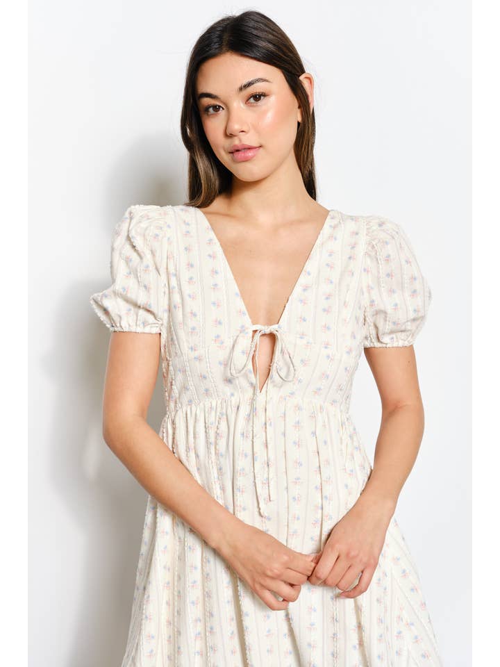 Ivory COTTAGE PUFF SLEEVE MINI DRESS for wholesale on Faire