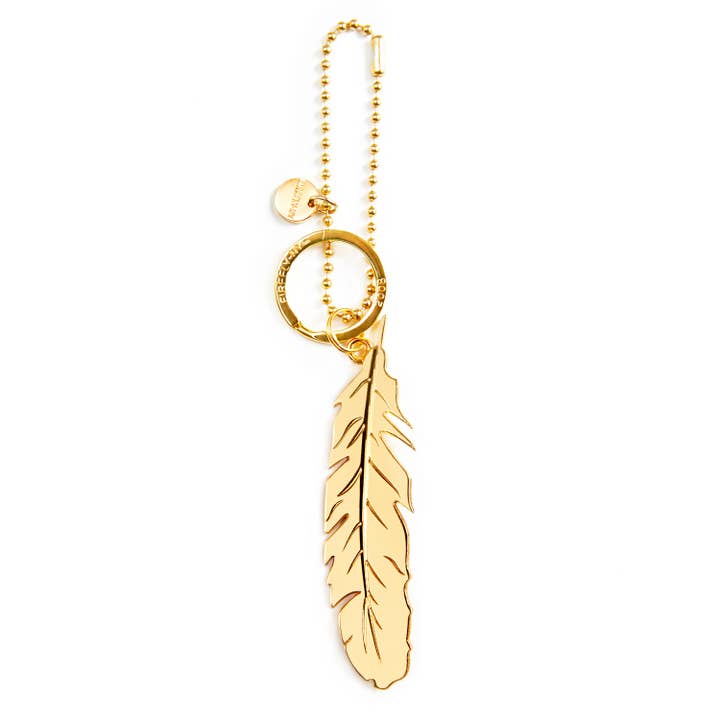 Feather Bag Charm - Gold for wholesale by Firefly Reflectors