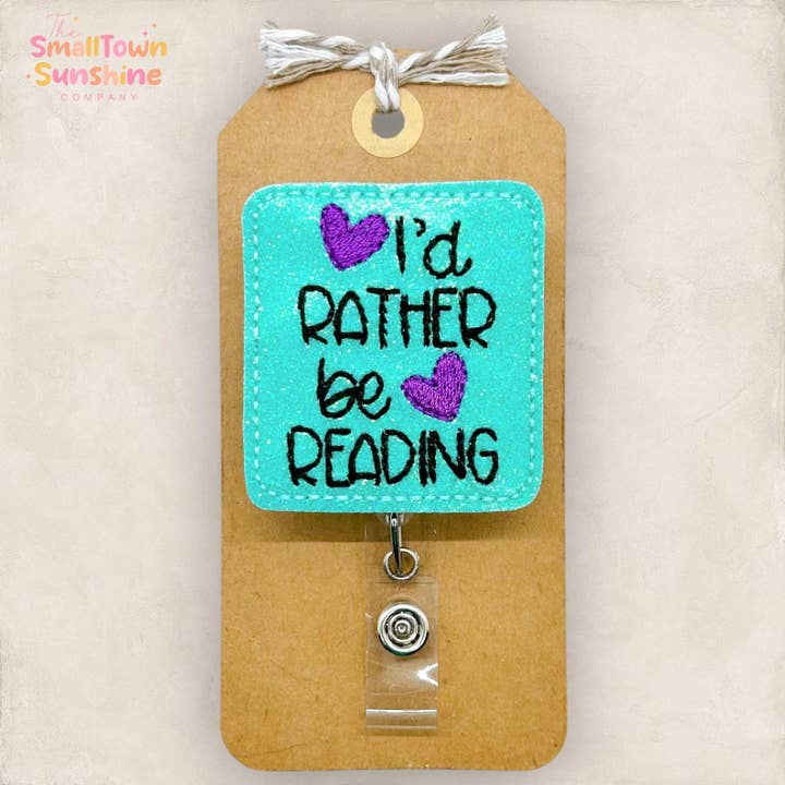 I'd Rather Be Reading Badge Reel for wholesale by The SmallTownSunshine Company