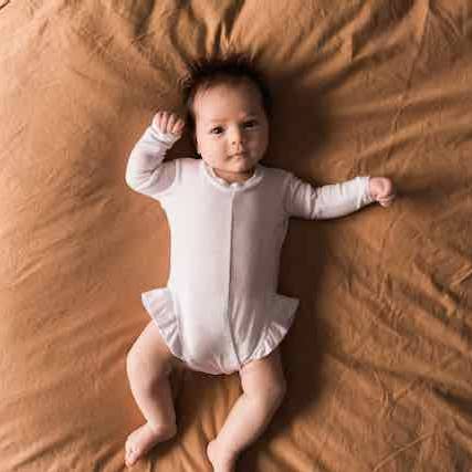 Easy Peasy Ruffle No-Snap Onesie in Long Sleeve for wholesale by Peasy Co.