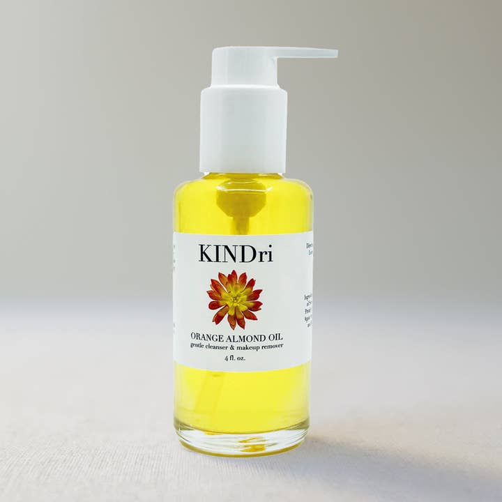 huile nettoyante à l'orange et aux amandes (nouvelle bouteille) pour la vente par KINDri Los Angeles