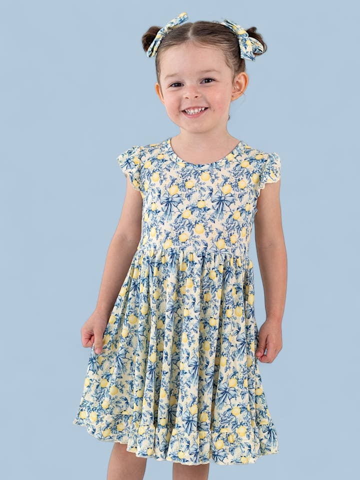 Dream Big Little Co. - Wholesale Dress - Kids - VINTAGE CITRUS TOILE CAP SLEEVE DREAM RUFFLE DRESS