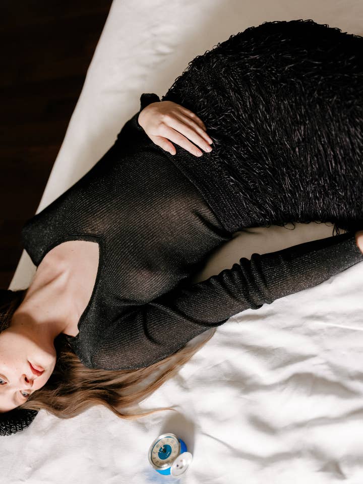 Black Glitter Ribbed V Neck Top for wholesale on Faire5