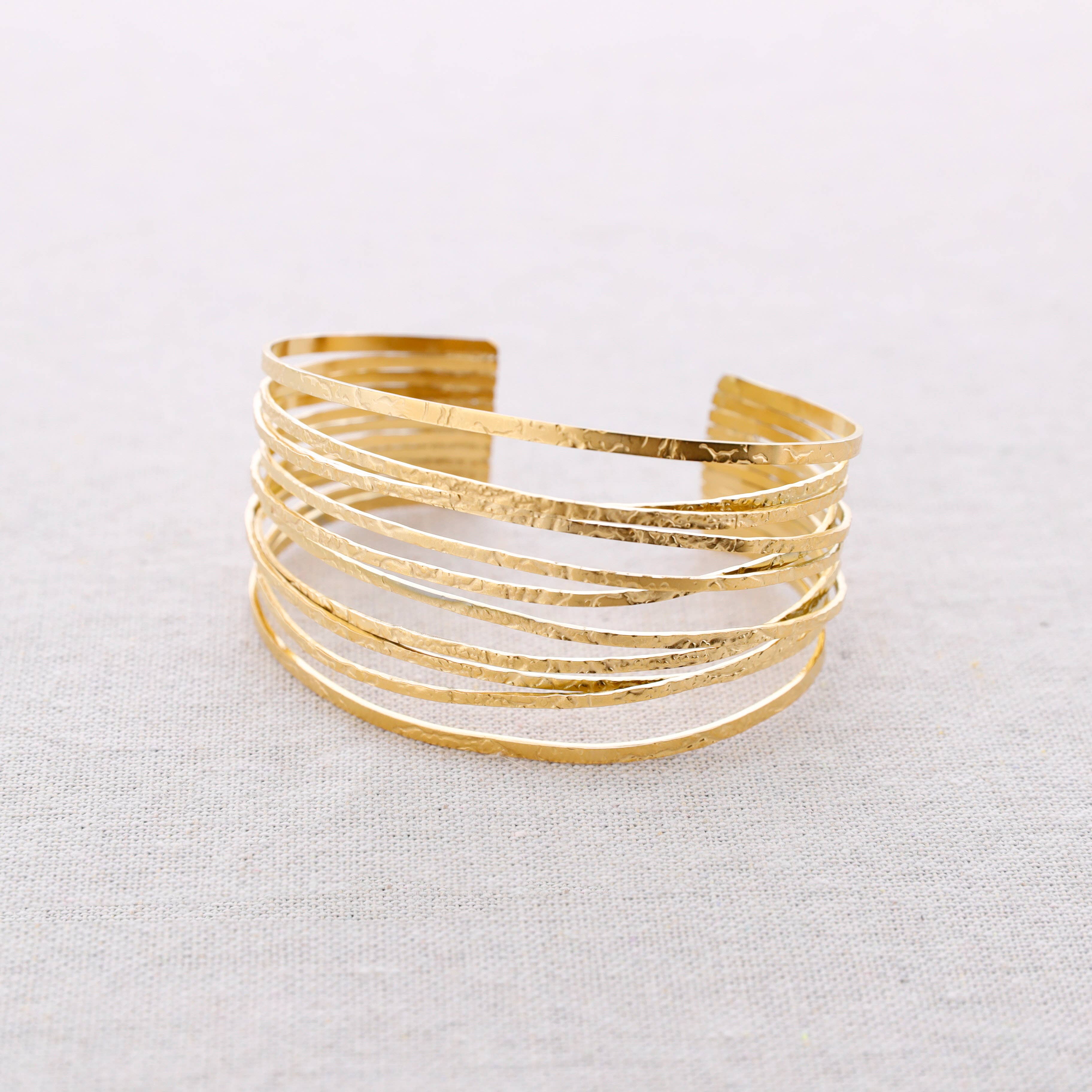 gold Multi Strip Steel Bracelet for wholesale on Faire0