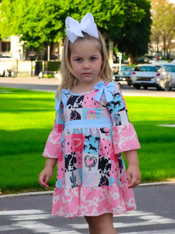 Kids Charm Online - Wholesale Dress - Kids - Beautiful wester patch printed girls dress with bows and cow printed hem.2