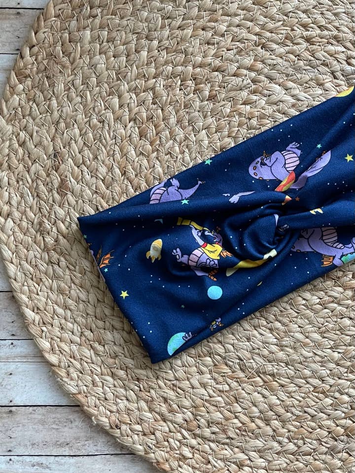 Planet Dragons Knit Twist Headband for wholesale by Designs by Rachel Joy