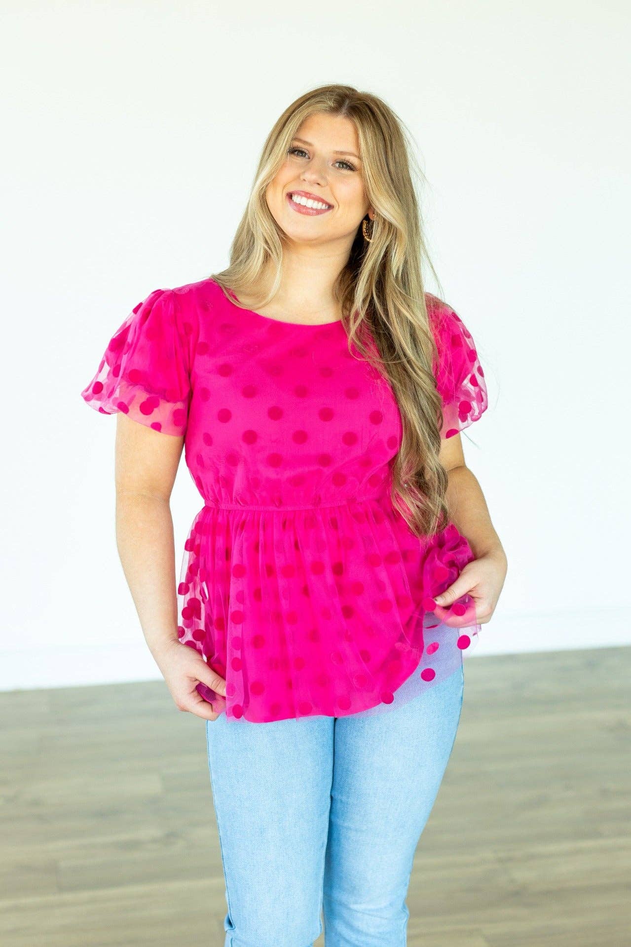 Pink Polka Dot Mesh Peplum Top for wholesale on Faire1