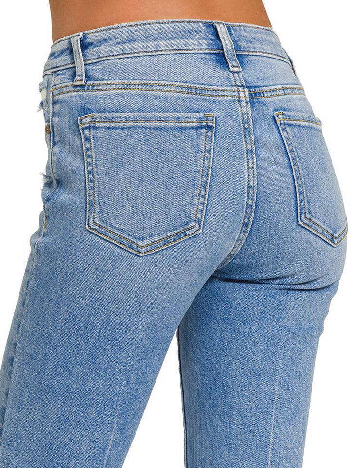 "._ Medium Washed Kick Crop Flare Denim Pants for wholesale on Faire5