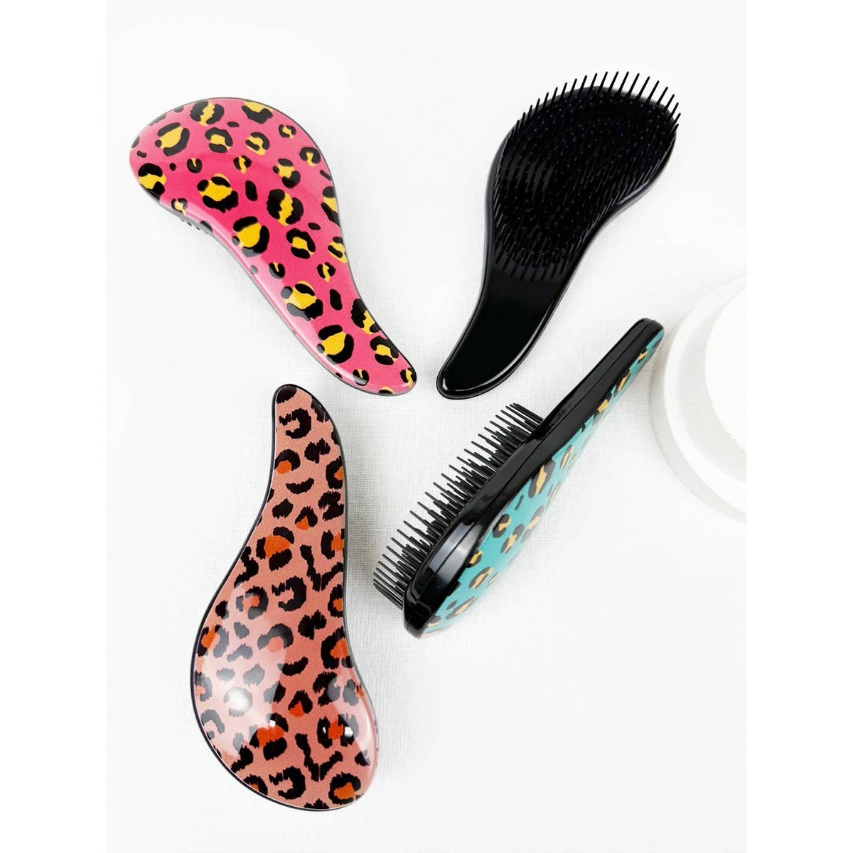 Glide on Easy Grip Leopard Print Hair Brush for wholesale on Faire6
