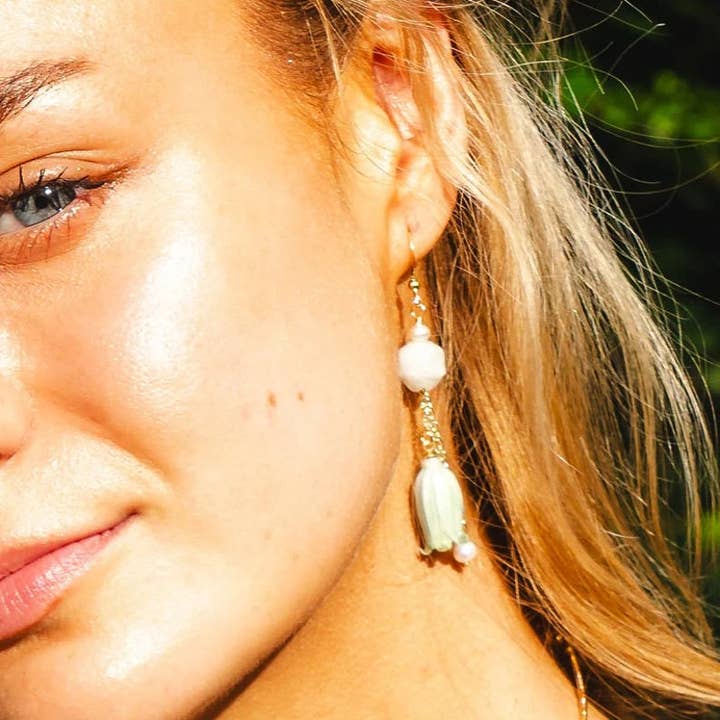 Real flowers Emerald magnolia Wind chime flower earrings for wholesale by NatureAmbient