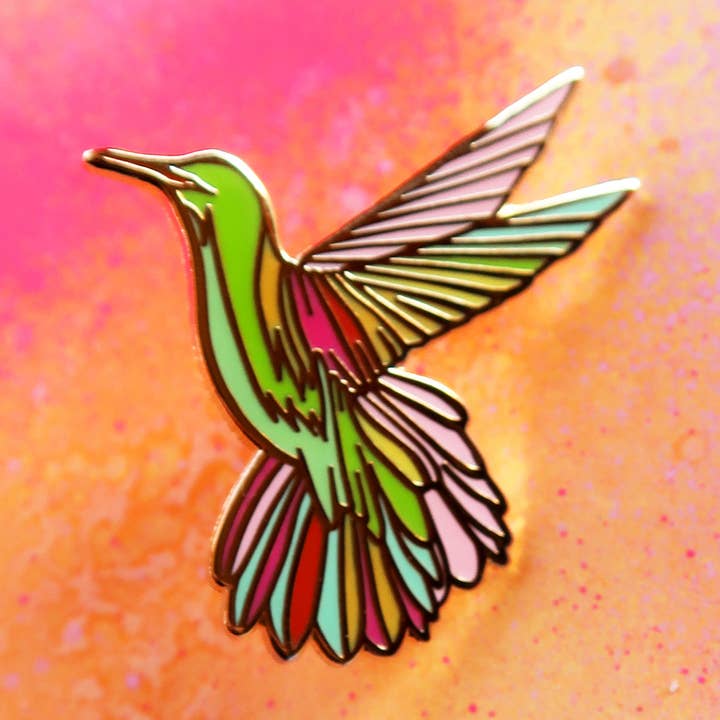 "Sunshine Hummingbird" Enamel Pin for wholesale by Paige Poppe Art