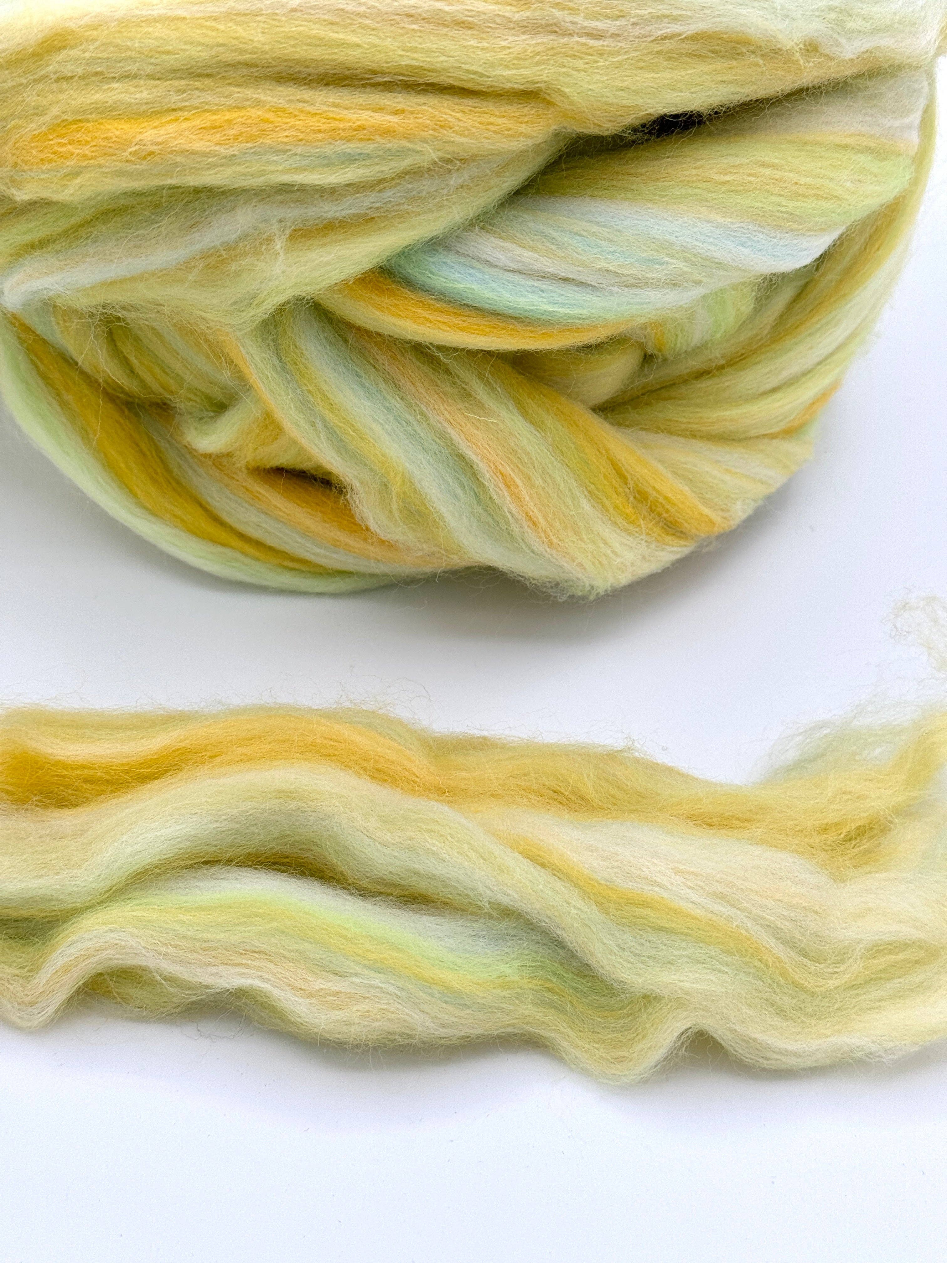 Yellow MERINO WOOL ROVING A47 MANNING for wholesale on Faire0