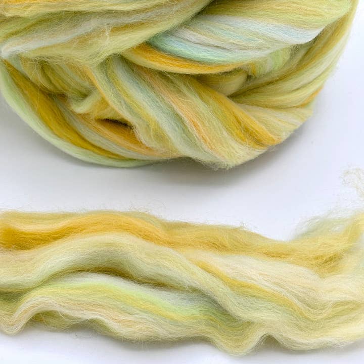Yellow MERINO WOOL ROVING A47 MANNING for wholesale on Faire