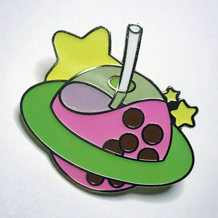 Intergalactic Bubble Tea Glow in the Dark Hard Enamel Pin for wholesale by Ark--Bark Arts!
