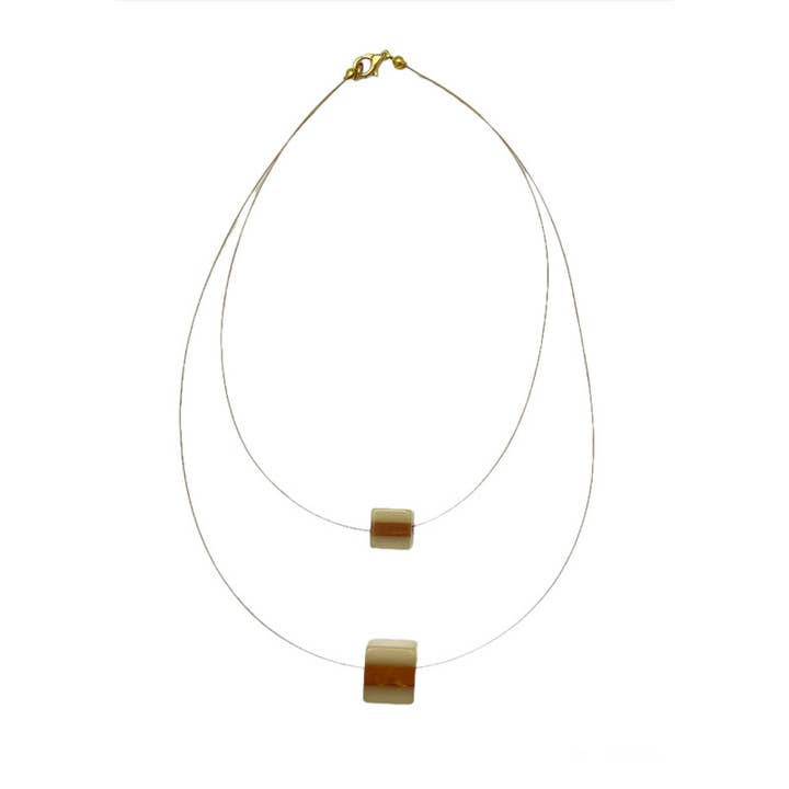 3D double cube necklace. steel and gold for wholesale by Gloria Mago