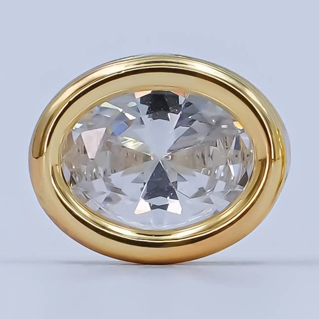 Perla ovale con castone in CZ trasparente placcata in oro 24K | B301 per la vendita all'ingrosso da parte di Aim Eternal