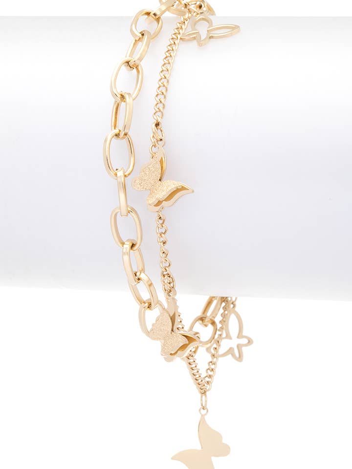 Bracelet en acier inoxydable avec petite breloque en forme de papillon pour la vente par Artini Accessories