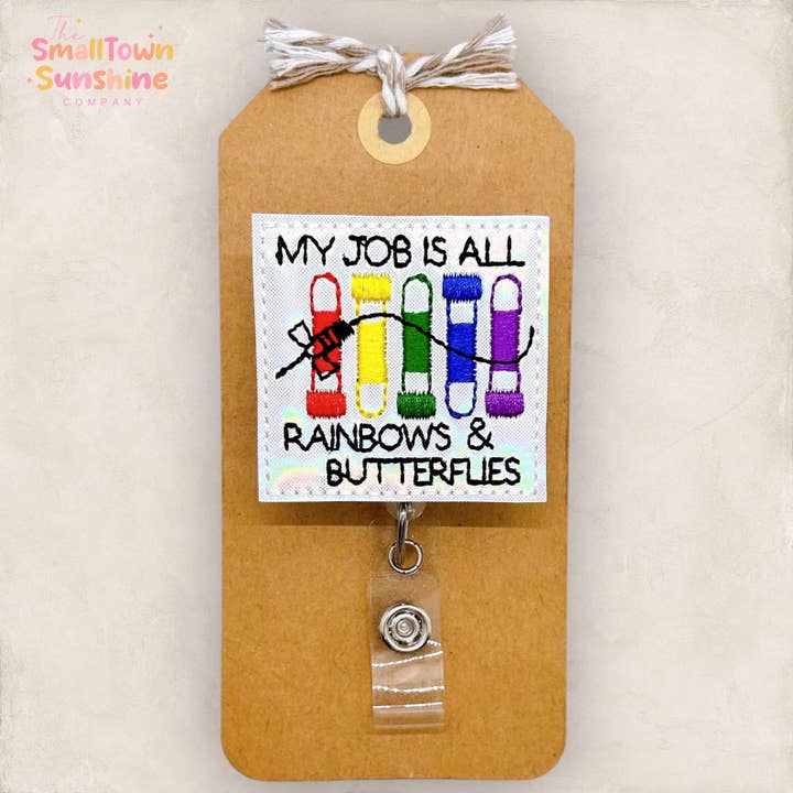 My Job is All Rainbows & Butterflies Badge Reel for wholesale by The SmallTownSunshine Company