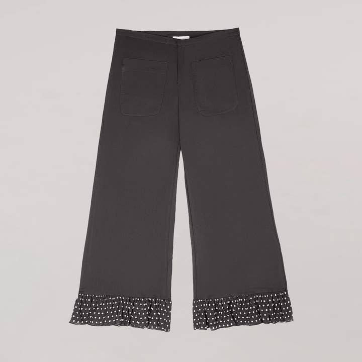 Pantalones marrones con lunares de Noctis Night and other Purchase Wholesale accessori moda mare. Free Returns & Net 60 Terms on Faire trending on Faire.