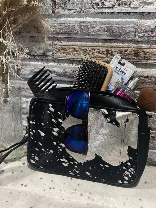 cowhide toiletry/makeup bag. for wholesale by FRINGE & LUXE