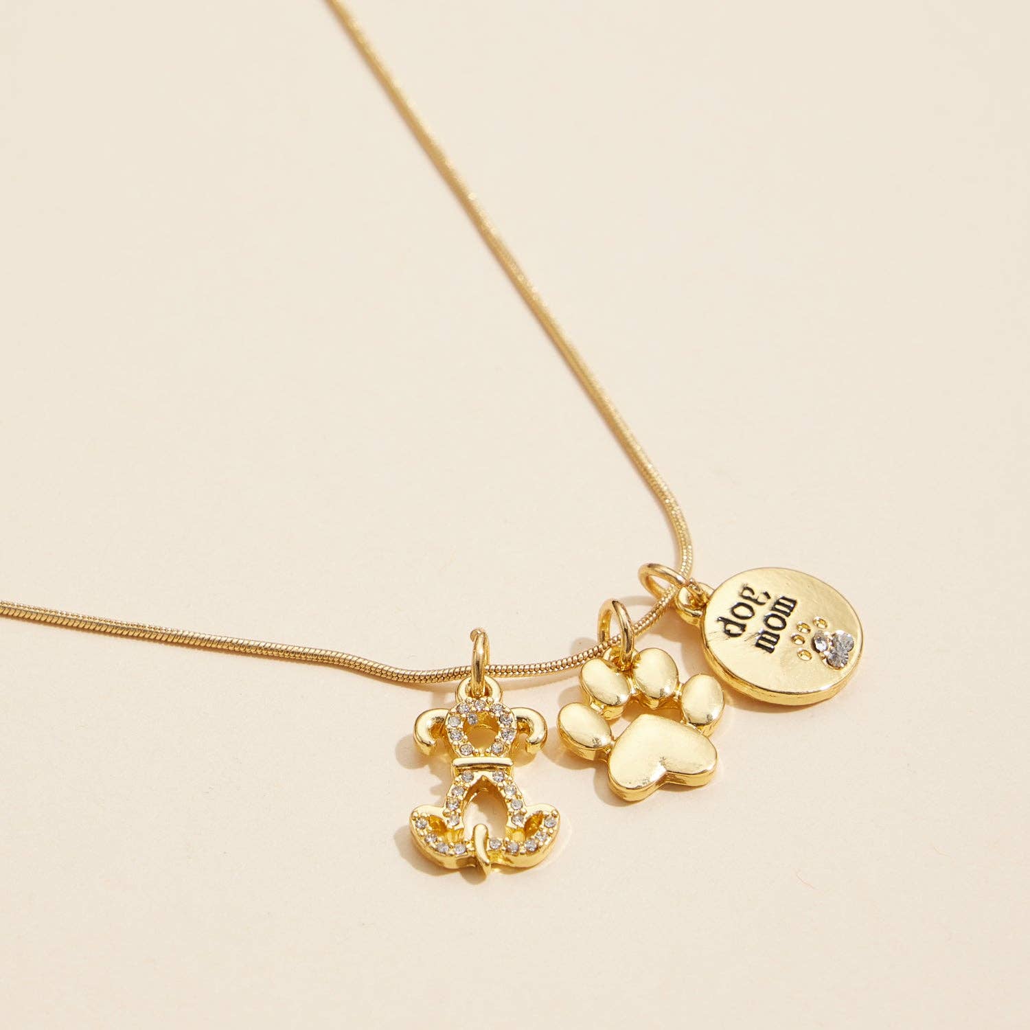 Dog Lover Charm Necklace – Gold Dipped Paw Pendant for wholesale on Faire0