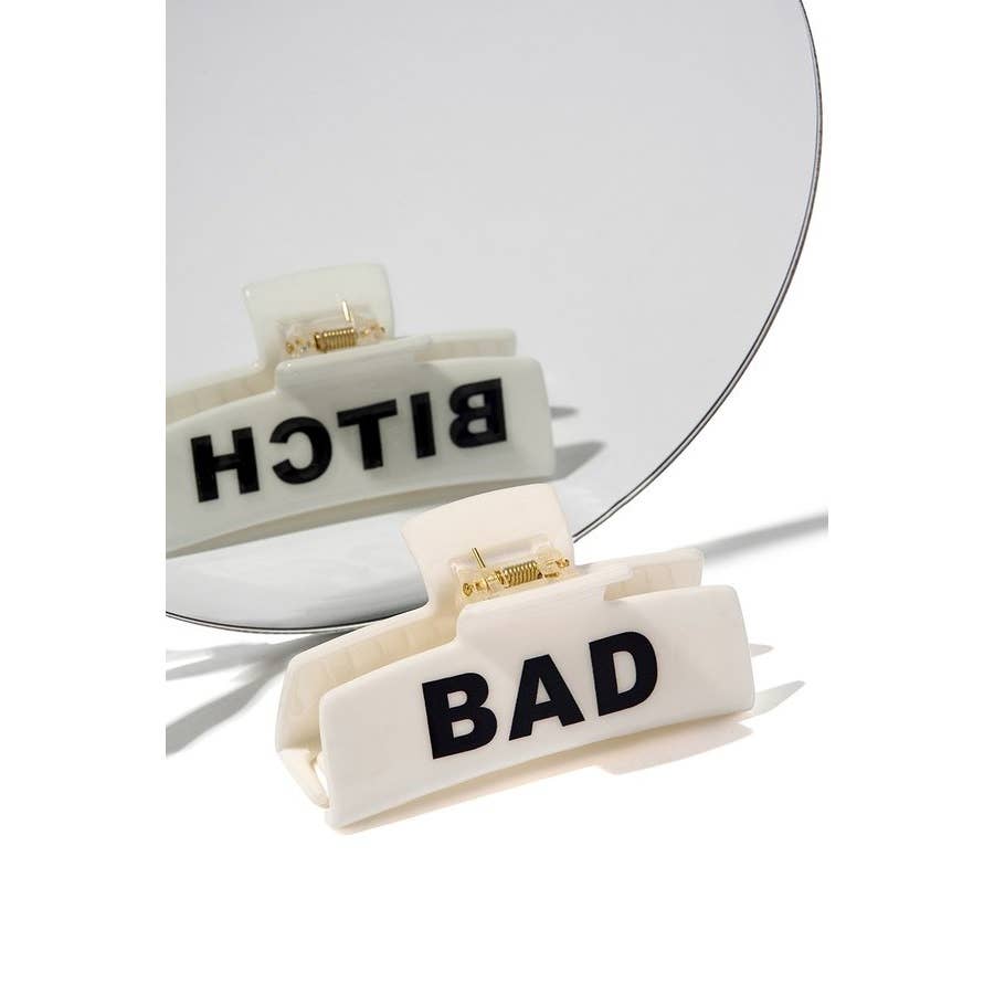 BIANCO Fermaglio per capelli a pinza rettangolare « Bad Bitch » in vendita all'ingrosso su Faire