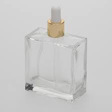 The Bottle Shoppe - Vente Supports pour huile essentielle - Flacon carré en verre flint 100 ml avec compte-gouttes doré1