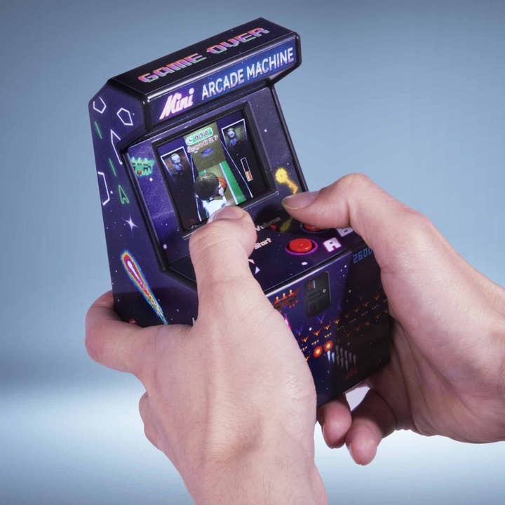 Thumbs Up GmbH - Wholesale Electronic Toy - Kids & Baby - ORB - Mini Arcade Machine - incl. 300x 16-bit games