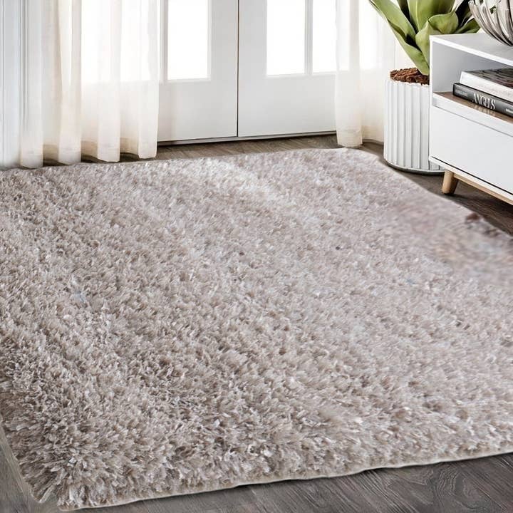 HomeRoots - Wholesale Area Rug - 8' x 11' Beige Shag Hand Tufted Area Rug