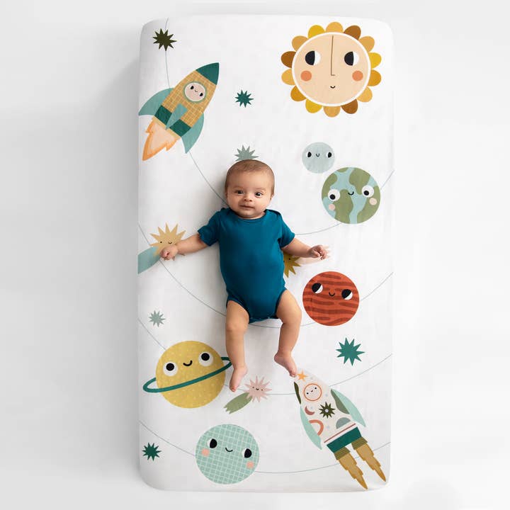 Cotton Sateen Crib Sheet: Space Explorer for wholesale by Rookie Humans