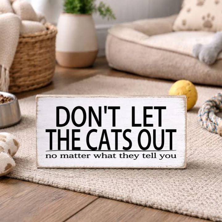 DON'T LET THE CATS OUT NO MATTER WHAT THEY TELL YOU for wholesale by Dudley's Cottage & Gifts